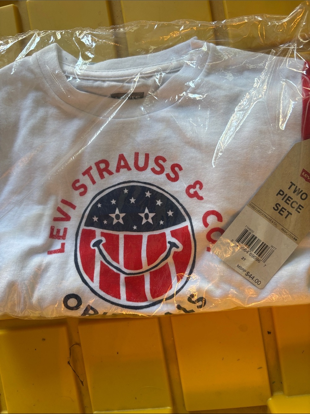 Levi's White Tee with Red & Navy Smiley Flag Graphic